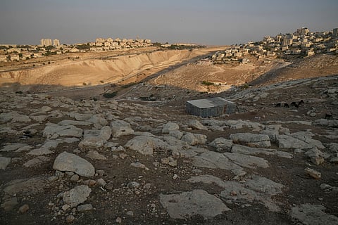 A general view shows the E1 area, an open tract of land east of Jerusalem, between the Israeli settlement of Maale Adumim, left and the occupied West Bank town of Eizariya, right.