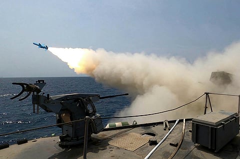 A missile is fired from a vessel during Iranian navy drill in the Gulf of Oman and the Indian Ocean.