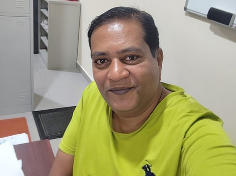 Anthony Ashok, the Bengaluru expat who bought the winning ticket, is all smiles.