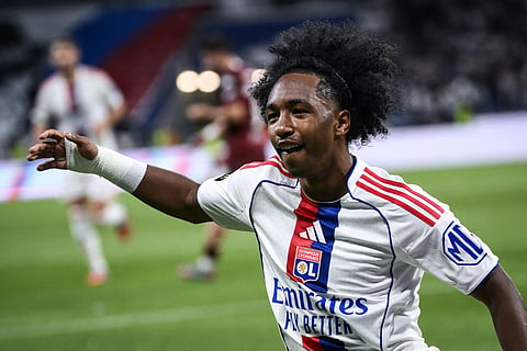 Lyon’s Belgian forward #11 Malick Fofana (C) celebrates after scoring a goal during the French L1 football match between Olympique Lyonnais (OL) and FC Metz at the Groupama Stadium in Decines-Charpieu, central-eastern France on August 23, 2025.