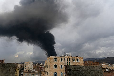 Smoke billows after an Israeli air strike on Yemen's Houthi-held capital Sanaa on August 24, 2025.