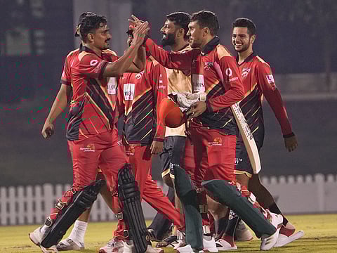 Desert Vipers players celebrate after a narrow win against Dubai Capitals in the DP World ILT20 Development Tournament on Sunday.