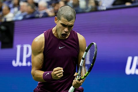 Carlos Alcaraz of Spain reacts against Reilly Opelka of the United States during the first round of the US Open on Monday.