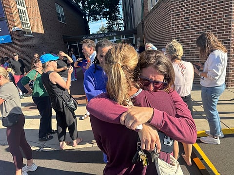 Parents await news of their children after a reported mass shooting at Annunciation Church on Wednesday, Aug. 27, 2025, in Minneapolis. (Richard Tsong-Taatarii/Star Tribune via AP)