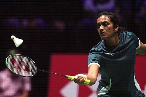 India's Pusarla Venkata Sindhu returns the shuttlecock to Indonesia's Putri Kusuma Wardani during the women's single quarter final match at the Badminton BWF World Championships at the Adidas Arena in Paris, on August 29, 2025.