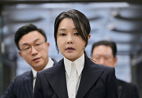 FILE - South Korea's former first lady Kim Keon Hee, wife of impeached former president Yoon Suk Yeol, arrives at a court to attend a hearing to review her arrest warrant requested by special prosecutors, in Seoul, South Korea, on Aug. 12, 2025.