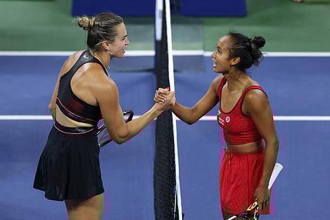 Belarus's Aryna Sabalenka (L) shakes hands with Canada's Leylah Fernandez after winning their women's singles third round tennis match on day six of the US Open tennis tournament at the USTA Billie Jean King National Tennis Center in New York City, on August 29, 2025.