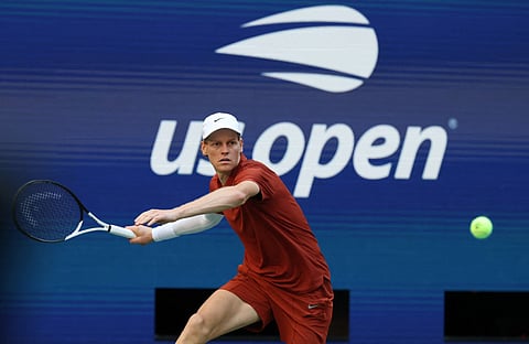 Italy's Jannik Sinner plays a shot to Canada’s Denis Shapovalov during their men's singles third round match on day seven of the US Open tennis tournament at the USTA Billie Jean King National Tennis Center in New York City, on August 30, 2025.