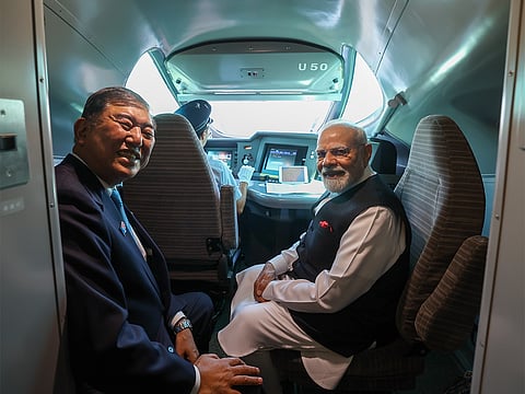India's PM Narendra Modi is seen inside Japan’s world-famous Shinkansen bullet train alongside Japanese PM Shigeru Ishiba.