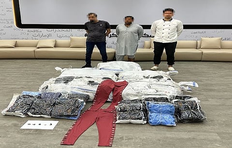 Three-member gang consisting of two Arab nationals and one Asian national.