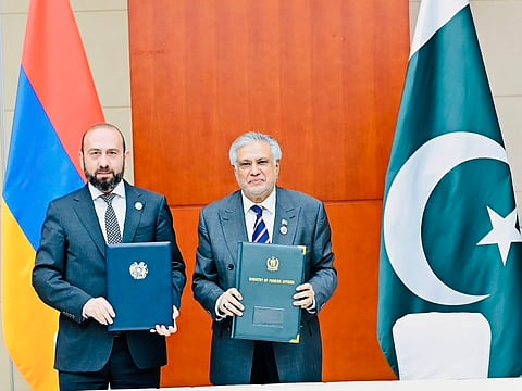 Pakistan Deputy Prime Minister and Foreign Minister Ishaq Dar with Foreign Minister of Armenia, Ararat Mirzoyan after agreement to establish diplomatic relations
