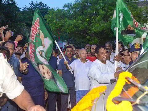Rashtriya Janata Dal Chief Lalu Prasad Yadav flags off the Tejashwi Sandesh Rath for campaigning across Bihar ahead of the Assembly elections, in Patna, Friday, August 22, 2025.