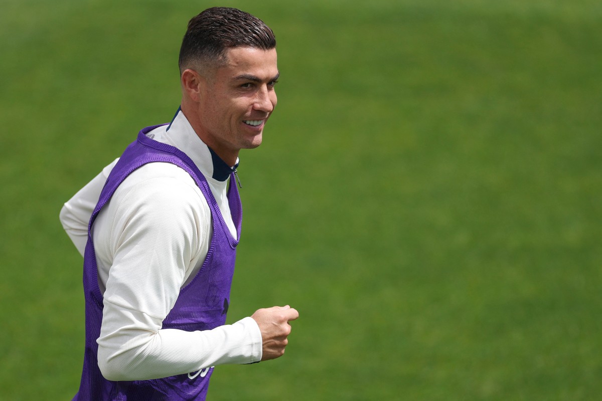 Portugal’s forward Cristiano Ronaldo smiles during a training session at Cidade do Futebol training camp in Oeiras, on September 2, 2025.