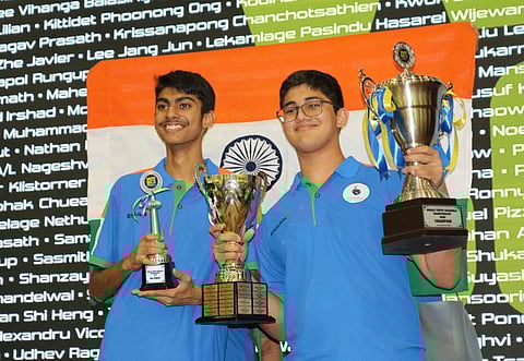 Madhav (right) clinched the championship in the penultimate round, finishing with an impressive 21 wins from 24 rounds.