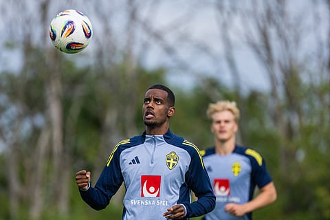 Swedish football player Alexander Isak (L) attends a training session with Sweden's national team in Bosön in Lidingö on the outskirts of Stockholm, Sweden, on September 2, 2025.