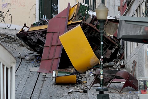 The wreckage of the Gloria funicular is pictured the day after the accident that killed 15 in Lisbon, on September 4, 2025.