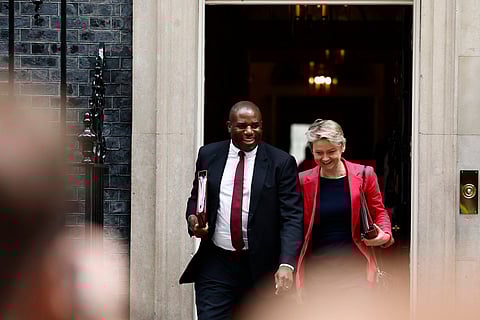 Britain's Foreign Secretary David Lammy (L) and Britain's Home Secretary Yvette Cooper leave after attending a Cabinet meeting at 10 Downing Street in London on July 23, 2024.