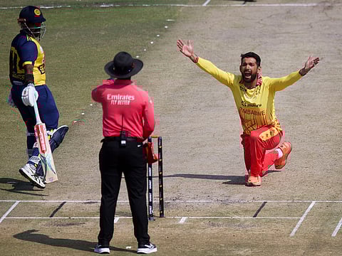 Zimbabwe's captain Sikandar Raza, right, successfully appeals for LBW during the T20 International cricket match between Zimbabwe and Sri Lanka, at the Harare Sports Club, in Harare, Zimbabwe, Saturday, Sept. 6, 2025.