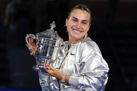 Belarus's Aryna Sabalenka poses with the trophy after defeating USA's Amanda Anisimova during their women's singles final tennis match on day fourteen of the US Open tennis tournament at the USTA Billie Jean King National Tennis Center in New York City, on September 6, 2025.