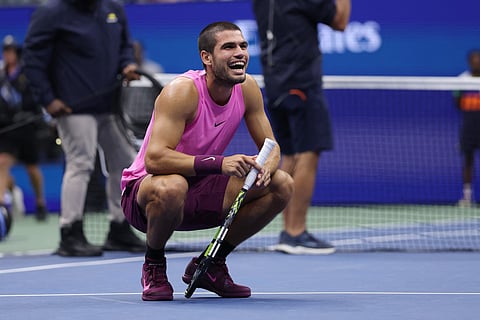 Carlos Alcaraz of Spain reacts after winning match point to defeat Jannik Sinner of Italy during their Men's Singles Final match on Day Fifteen of the 2025 US Open at USTA Billie Jean King National Tennis Center on September 07, 2025 in New York City.