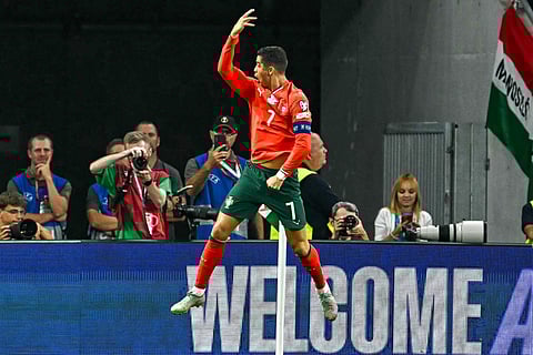 Portugal's forward Cristiano Ronaldo celebrates scoring a penalty goal 1-2 during the 2026 World Cup qualifiers Europe zone group F football against Hungaryon September 9, 2025 in Budapest, Hungary.