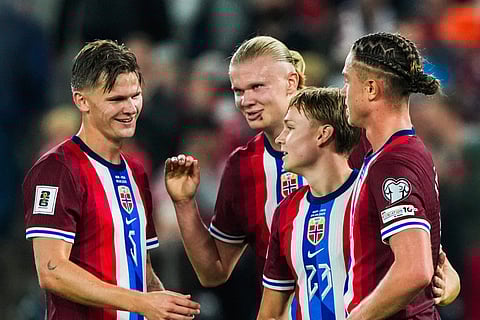 Norway's players celebrate after winning the 2026 World Cup qualifiers Europe zone group I football match against Moldova on September 9, 2025 in Oslo, Norway.