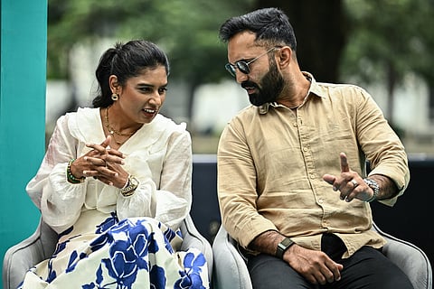 Mithali Raj (left), former captain of the Indian women's cricket team, and former Indian cricketer Dinesh Karthik attend the unveiling of the ICC Women's Cricket World Cup Trophy in Bengaluru on September 13, 2025.