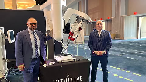 Sherif Beshara (right), Group CEO, American Hospital Dubai and Dr Hatem Moussa, Chief of Surgery and Robotics, American Hospital Dubai stand next to the Da Vinci SP (Single Port) robotic surgical system
