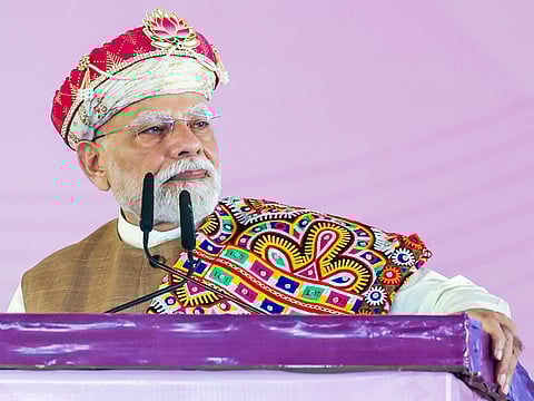 India’s Prime Minister Narendra Modi addresses a public meeting during the Foundation Stone laying ceremony and launch of various projects at Dhar, Madhya Pradesh, on Wednesday.