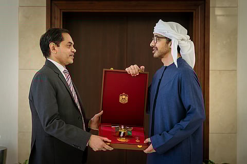 Sheikh Abdullah bin Zayed Al Nahyan presenting the decoration to Sunjay Sudhir.