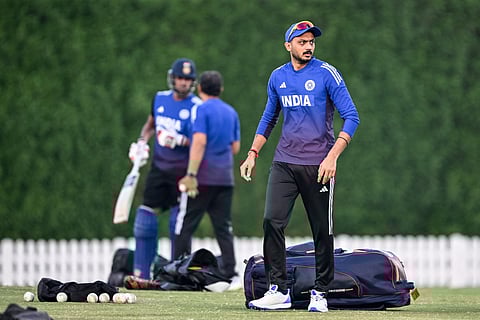 India's Axar Patel (R) attends a practice session at the International Cricket Council (ICC) Academy in Dubai on September 18, 2025, on the eve of their Asia Cup 2025 Twenty20 International cricket match against Oman.