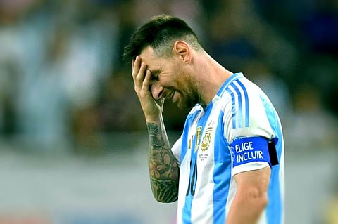Lionel Messi wears a dejected look during the clash against Ecuador. The Argentine forward missed the penalty but still his team won.