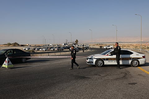 Israeli security forces close off a road leading to the King Hussein (Allenby) bridge, the main border crossing between the Israel-occupied West Bank and Jordan, following a shooting attack on September 18, 2025.