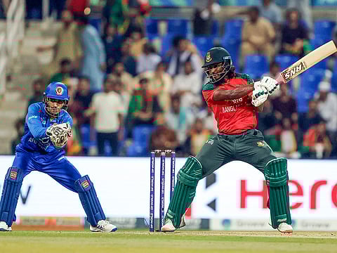 Bangladesh's Jaker Ali plays a shot during the Asia Cup 2025 match against Afghanistan, at Sheikh Zayed Stadium in Abu Dhabi.