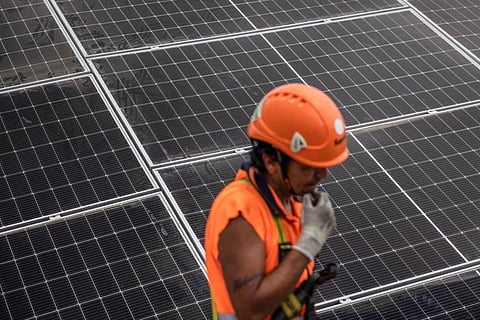 A solar panel installation crewmember. Spain is set to generate more than 50% of power from renewables.