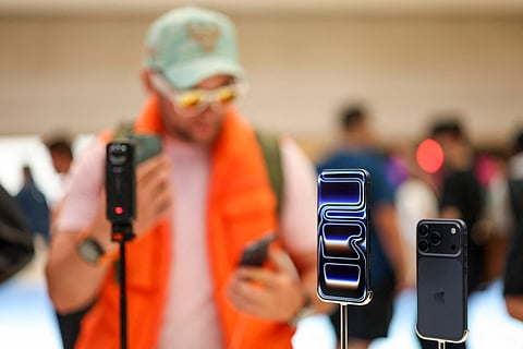 New Apple iPhone 17 models are displayed at the Apple Store in New York on September 19, 2025.