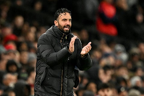 Manchester United's Portuguese head coach Ruben Amorim shouts instructions to the players from the touchline during the English Premier League football match between Manchester United and Chelsea at Old Trafford in Manchester, north west England, on September 20, 2025.