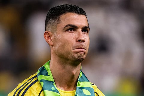 Nassr's Portuguese forward #07 Cristiano Ronaldo looks on during the line-up before the Saudi Pro League football match between Al-Nassr and Al-Riyadh SC at Al-Awwal Park in Riyadh on September 20, 2025.