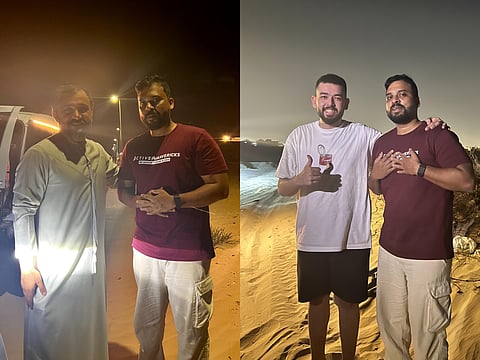 Saideep Kuchana with the Sharjah Police officers, whom he identified as Bu Khalifa Al Ameeri and Mohammed Al Raise, who assisted in the desert rescue.