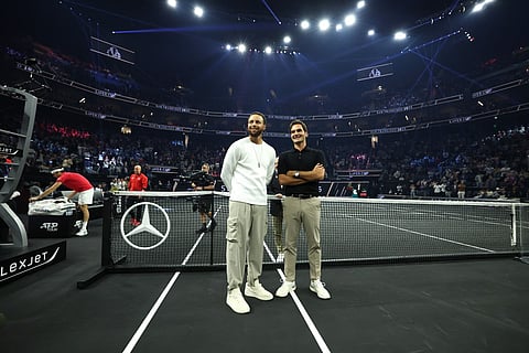 NBA player Steph Curry of the Golden State Warriors talks with former tennis player Roger Federer on court during day two of Laver Cup 2025 at Chase Center on September 20, 2025 in San Francisco, California.