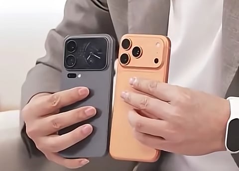 The Xiaomi 17 Pro Max, fitted with a rear screen, side by side with the iPhone 17 Pro Max. The back screen isn't just a gimmick — it handles calls, music, travel info, countdowns, and even doubles as a rear-camera selfie viewfinder. It's also compared  to the mini displays on flip-style foldables, except this one doesn’t need a hinge to show off.