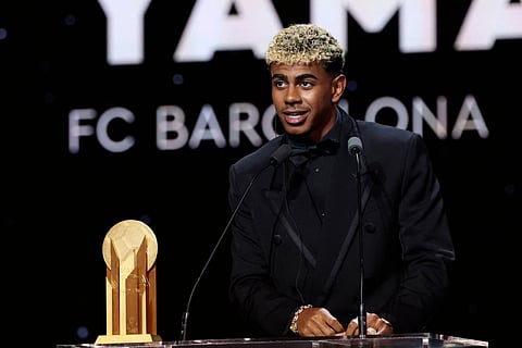 Barcelona's Spanish forward Lamine Yamal speaks after receiving the Kopa Trophy for the best under-21 player during the 2025 Ballon d'Or France Football award ceremony at the Theatre du Chatelet in Paris on September 22, 2025.