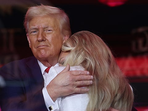 Erika Kirk joins US President Donald Trump onstage during the memorial service for political activist Charlie Kirk at State Farm Stadium.