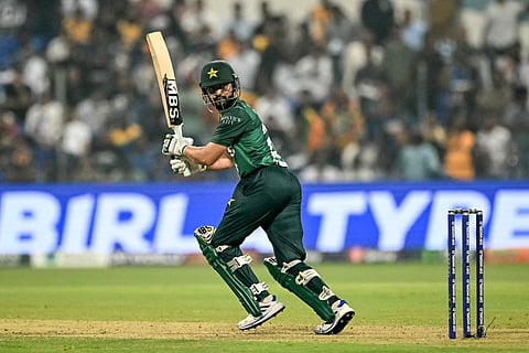 Pakistan's Mohammad Nawaz watches the ball after playing a shot during the Asia Cup 2025 Super Four Twenty20 international cricket match against Sri Lanka at the Sheikh Zayed Cricket Stadium in Abu Dhabi on September 23, 2025.