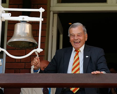 Retired umpire Dickie Bird rings the five minute bell during play on the first day of the first cricket Test match between England and New Zealand at Lord's cricket ground in London on May 21, 2015.
