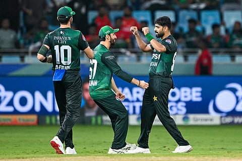 Pakistan's Haris Rauf celebrates with teammates after dismissing Bangladesh's Taskin Ahmed during the Asia Cup 2025 Super Four Twenty20 international cricket match at the Dubai International Stadium in Dubai on September 25, 2025.