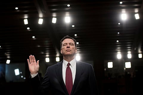 Ousted FBI director James Comey is sworn in during a hearing before the Senate Select Committee on Intelligence on Capitol Hill June 8, 2017 in Washington, DC.
