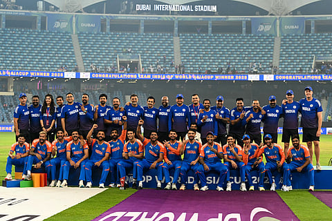 Indian team pose during the presentation ceremony at the end of the Asia Cup 2025 Twenty20 international cricket final match against Pakistan at the Dubai International Stadium in Dubai on September 28, 2025.
