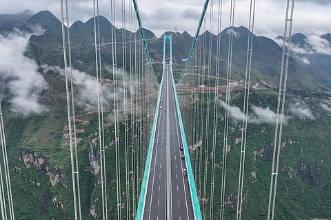 The Huajiang Grand Canyon Bridge, the world’s highest, is seen in China’s southwest Guizhou province on September 27, 2025.