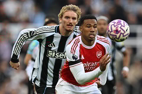 Arsenal's Brazilian defender #06 Gabriel Magalhaes chases the ball during the English Premier League football match between Newcastle United and Arsenal at St James' Park in Newcastle-upon-Tyne, north east England on September 28, 2025.